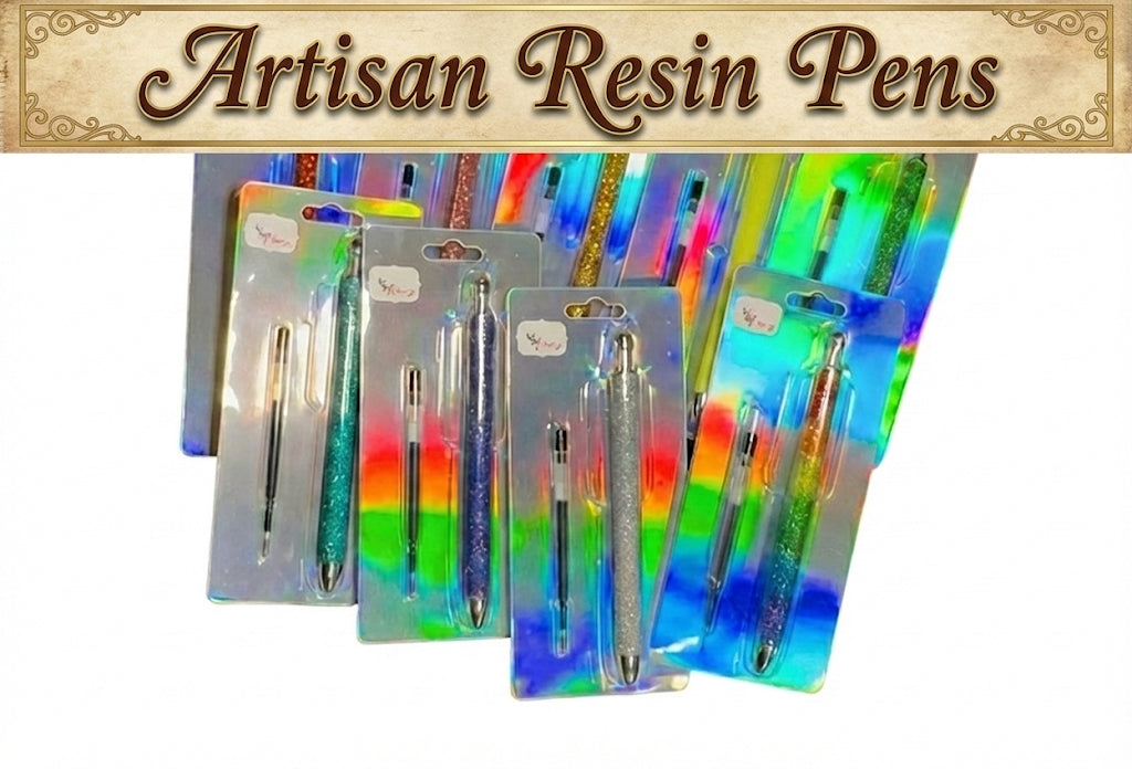 Artisan Resin Pens in packaging with colorful resin tips on a white background.