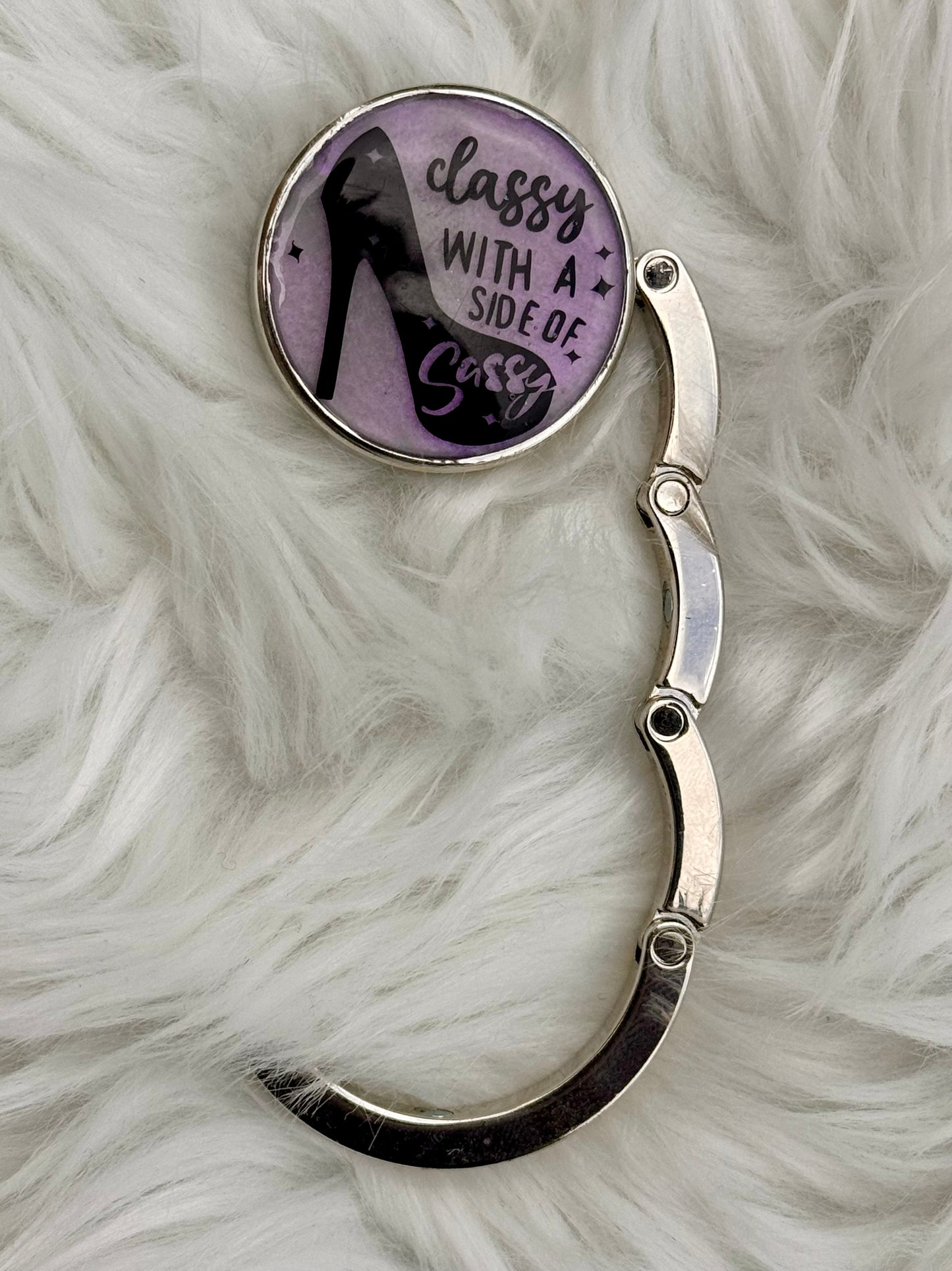 Collapsible purse holder with “Classy with a side of sassy” words
