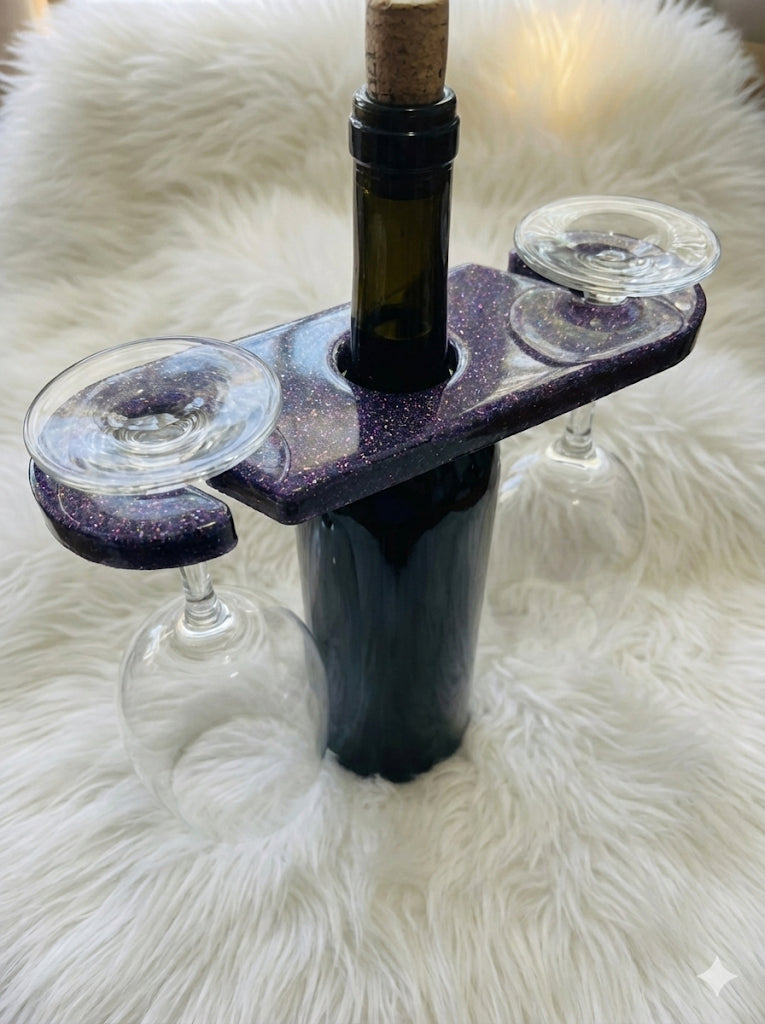 Wine bottle holder with two glasses on a fluffy white surface