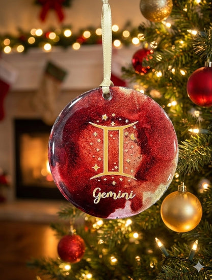 Decorative ornament with 'Gemini' on a Christmas tree