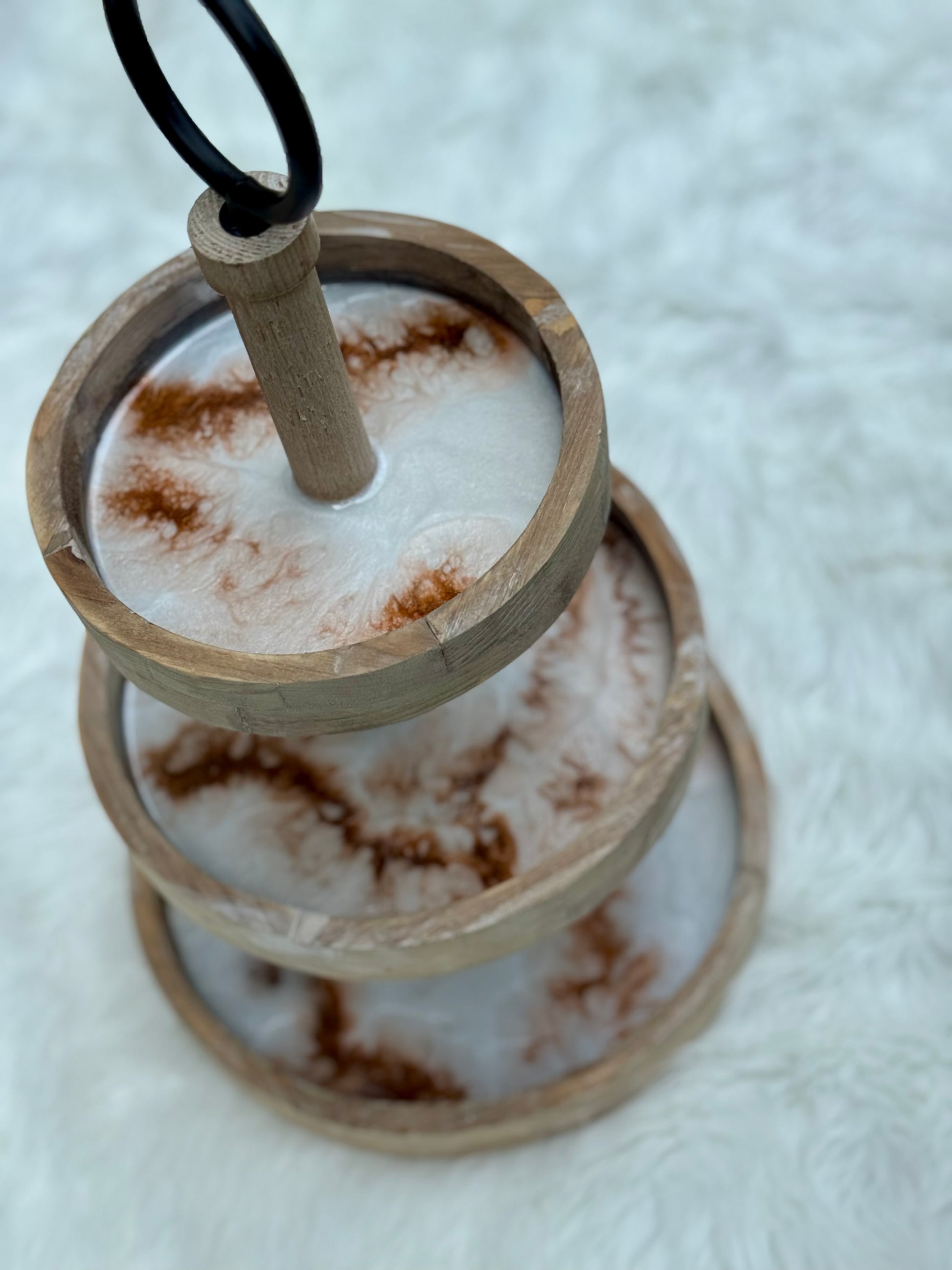 Three-tiered wooden tray (white and bronze) with a white background