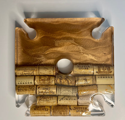 Wooden caddy with wine cork design on a white background