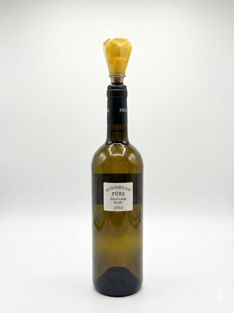 Wine bottle with a yellow foil cap on a white background